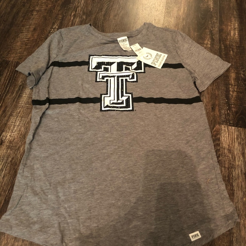 Pink Texas tech shirt.
